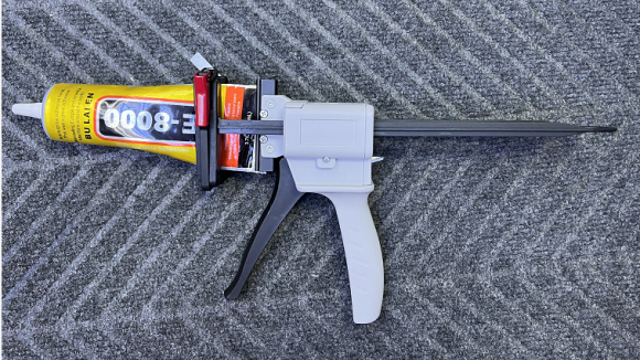 Пистолет (диспенсер) для клея в тюиках
